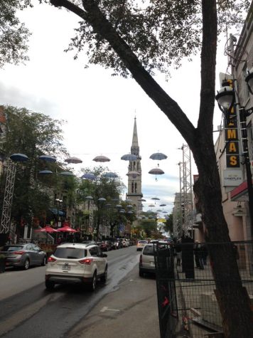 A display of hanging umbrellas in downtown Montreal.