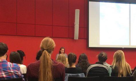 Pamela Olson speaks to a room full of students, faculty and community members. (Wei Cai/Amherst Wire)