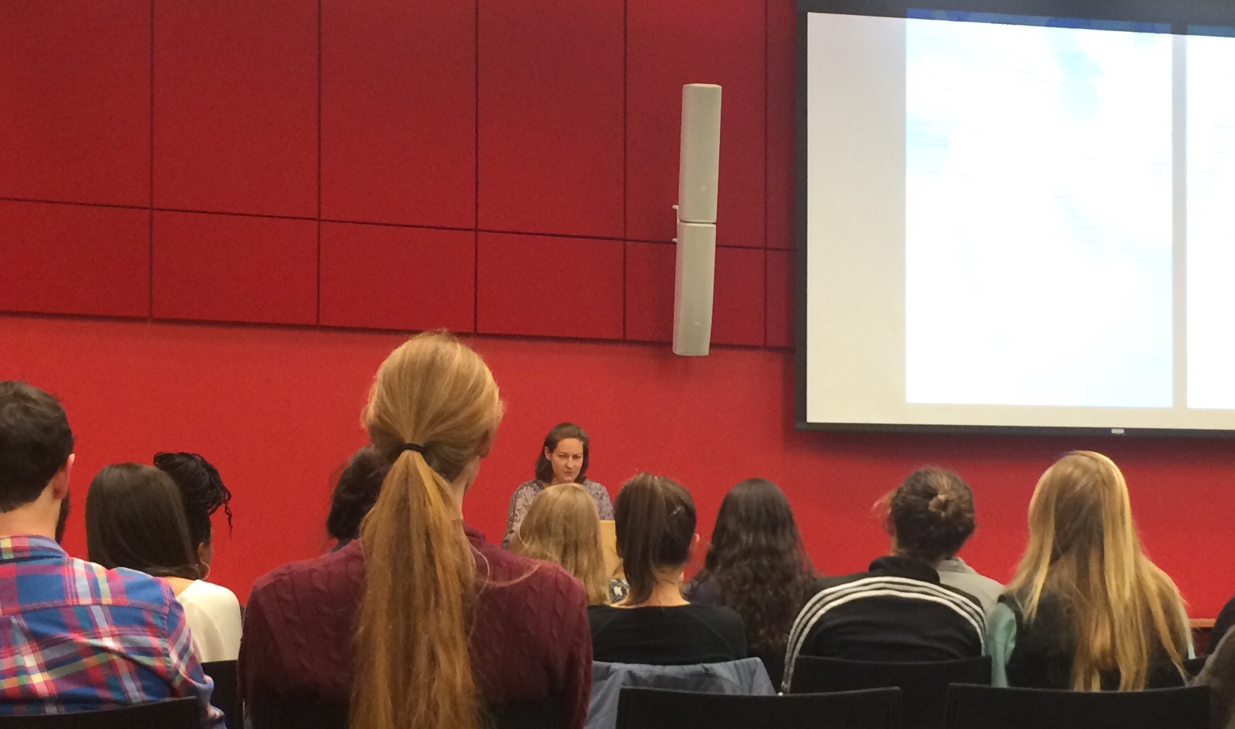 Pamela Olson speaks to a room full of students, faculty and community members. (Wei Cai/Amherst Wire)