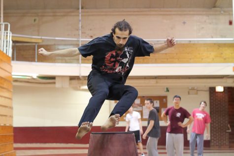 Jared Yeager clears a hurdle.