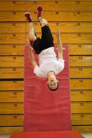 Matt Murch completes a back flip during a practice session 