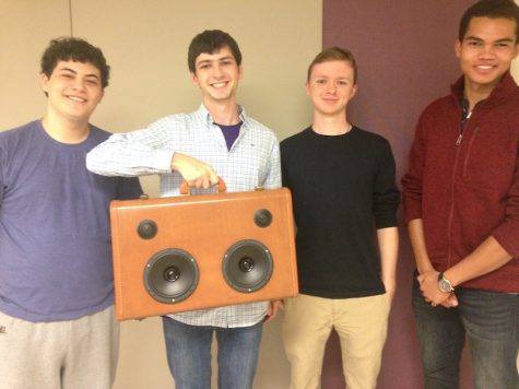 The InCase poses with their speaker. From left: Toby Cashook, Aidan MacBain, Ian Birle and Pandeni Idhenga.