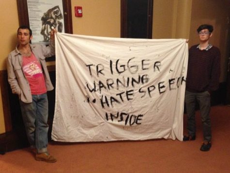 (Mike Ma/Breitbart.com) UMass students protesting “The Triggering: Has Political Correctness Gone Too Far?” event with a bedsheet saying “TRIGGER WARNING HATE SPEECH INSIDE.” The College Republicans Club of UMass event featured a discussion with Milo Yiannopoulos, Dr. Christina Hoff Sommers and Steven Crowder. Protesters accused the panel of hate speech and demanded they leave campus. 