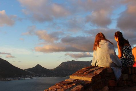 Watching the sunset while sitting on Chapman's Peak.