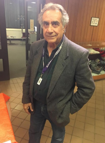 Kaz Romani helped run a bake sale for the Amherst Senior Center inside the poll.