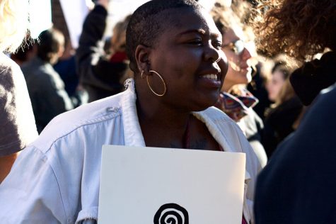 Ebun Nazon-Power, 20, a student at Hampshire College, joins in chanting "not my president" at the protest in Springfield on Sunday, Nov. 13, 2016. (Morgan Hughes/Amherst Wire)