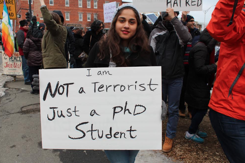 (FILE PHOTO) Sharon Montazeri, an Iranian Ph.D. student at UMass, participates at a demonstration against Trumps travel ban against mainly Muslim countries in Amherst in January 2017.