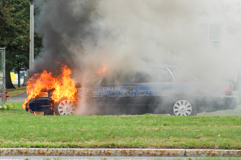 A University of Massachusetts police vehicle was destroyed Monday morning at Haigis Mall after its engine suddenly caught fire. (Laurie Sexton/Amherst Wire)