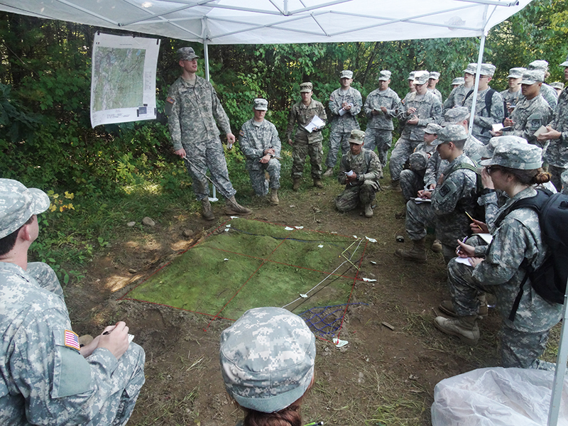 Cadet John Geenty of the UMass Amherst Army ROTC Minuteman Battalion teaches his peers about land navigation in another field training exercise Saturday, Sept. 16 in Montague, Mass. (Jon Decker/Amherst Wire)