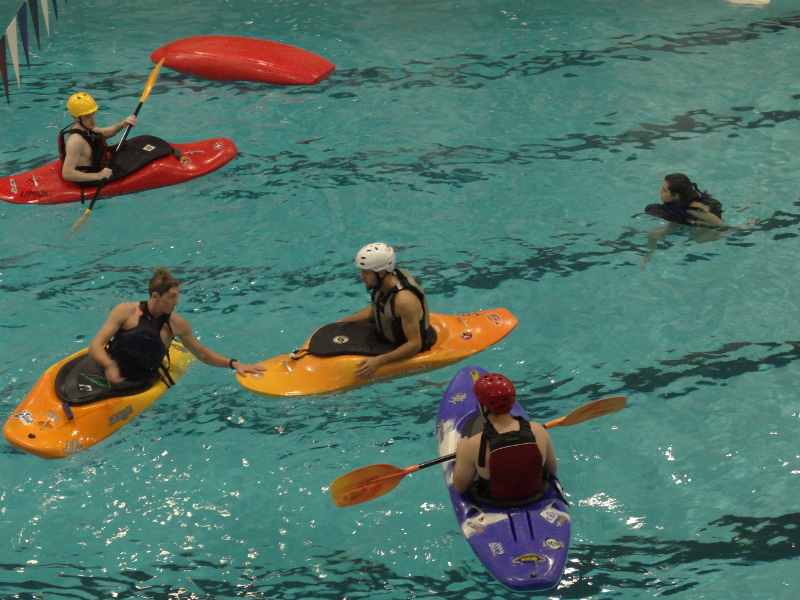 Students practice kayaking in an open pool at Totman Gymnasium. (Jon Decker/Amherst Wire)