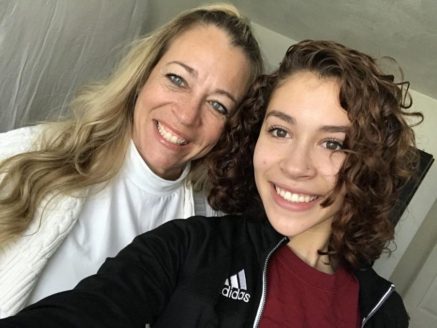 Alex and her mother, U.S. Army Command Sergeant Major Donna Ortiz, after reuniting during UMass footballs Homecoming game on Nov. 3. (Courtesy of Alejandra Ortiz)