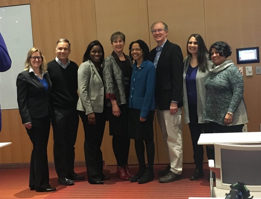 Dr. Gilda Barabino, center in the blue green jacket, posing with University of Massachusetts Amherst faculty and staff. (Julia Donohue/ Amherst Wire)
