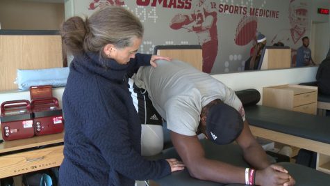 Jennifer Brodeur stands among the four women at the top of college athletic training