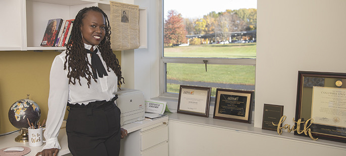 Jamila Lyiscott poses for Spotlight Scholar article