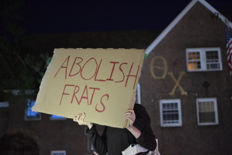 Protester in front of Theta Chi by Abbie Gracie