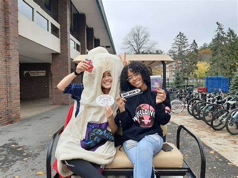 A couple of Players, one in a condom costume. The Players ride around campus occasionally in the golf cart to give out condoms and spread the word about sexual health and NRPB. Image from their Facebook. 