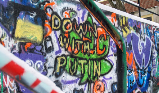 Spray paint by stairs across from Franklin Dining Hall at UMass. Photo Credit: Selene Bonafini 

