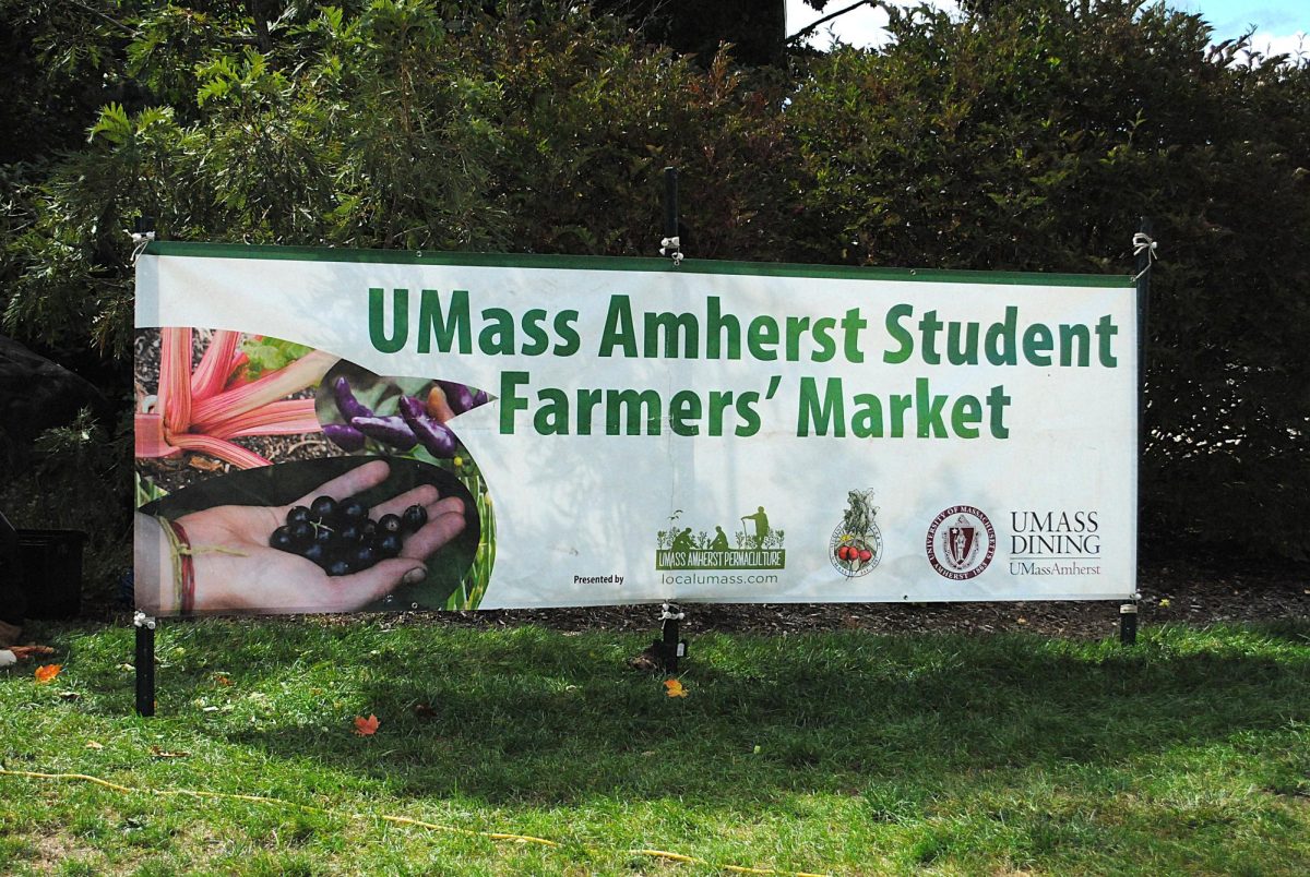 A banner at the front of Goodell Lawn welcomes students to the UMass Student Farmer's Market.